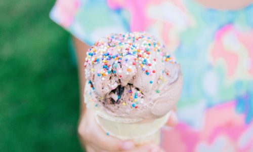 girl holding ice cream cone