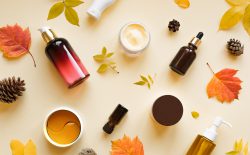 Autumn,Skin,Care,Products,And,Autumn,Leaves,On,Yellow,Background,